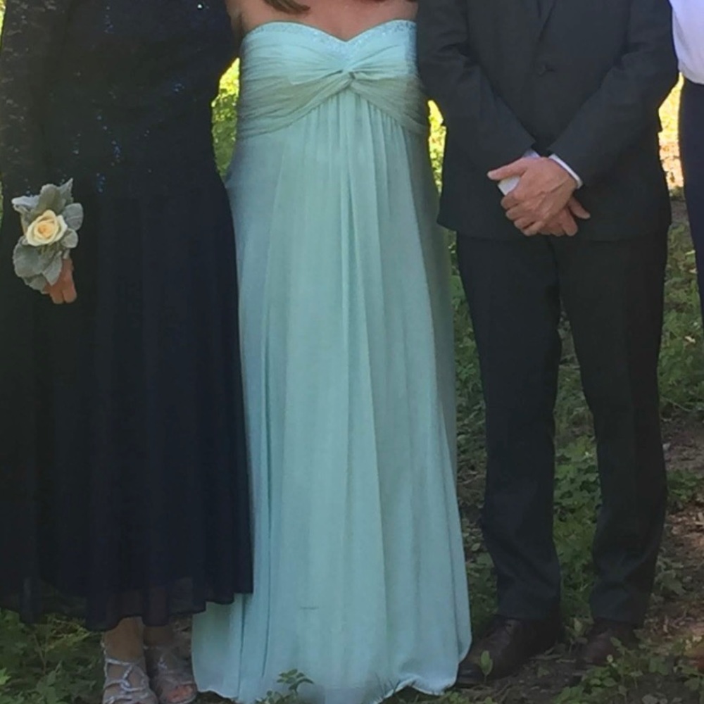 Mint green, David’s bridal strapless dress size 16